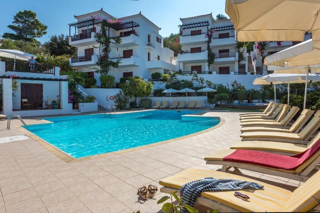 Seasonal outdoor pool, open 8:30 AM to 10:00 PM, pool umbrellas