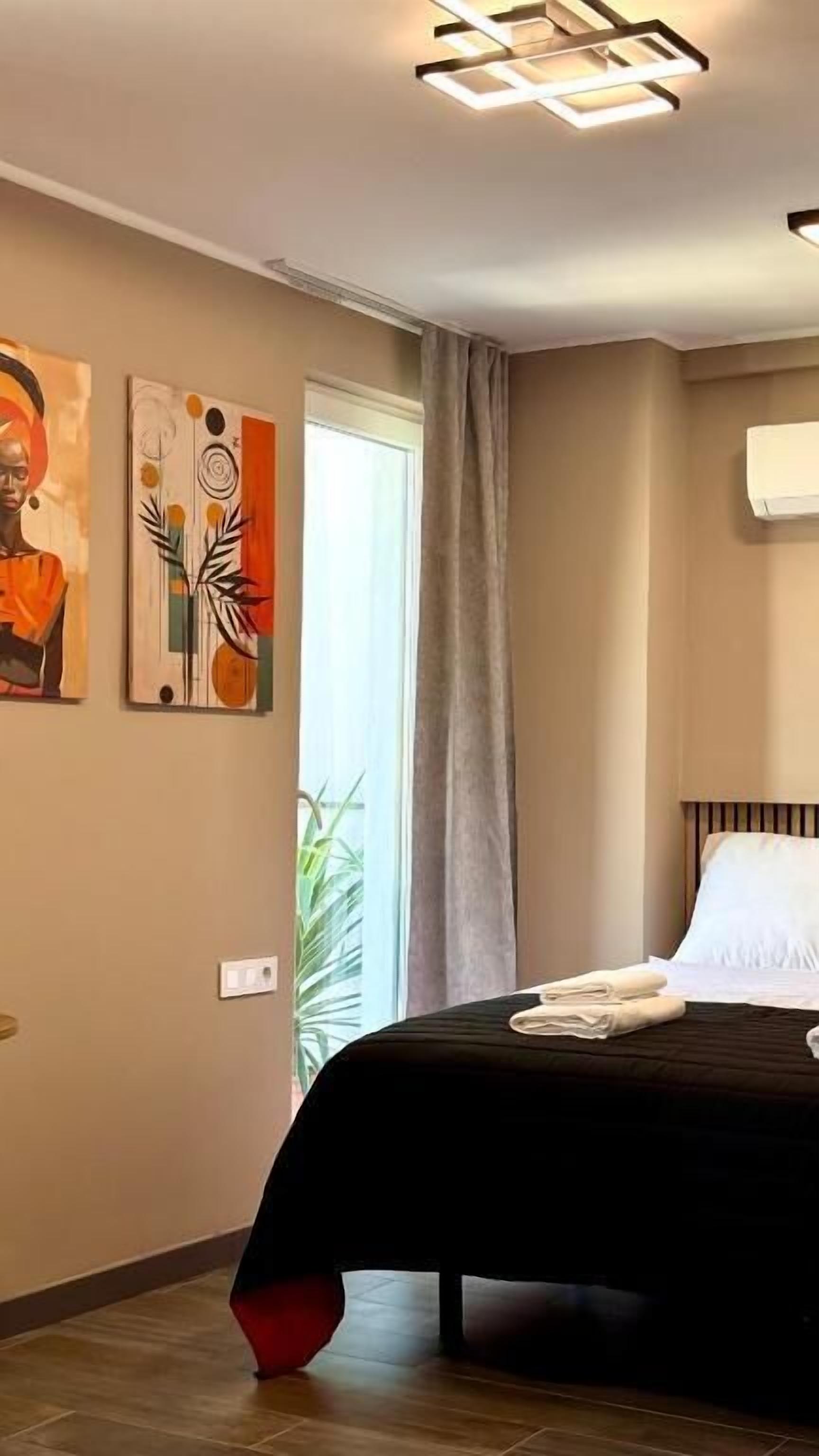 Deluxe Double Room, City View | In-room safe, desk, blackout drapes, iron/ironing board