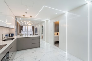 Premium Apartment, 4 Bedrooms, City View | Private kitchen | Full-sized fridge, microwave, oven, stovetop - Sunny The Galleria Metropole (ThuThiem)