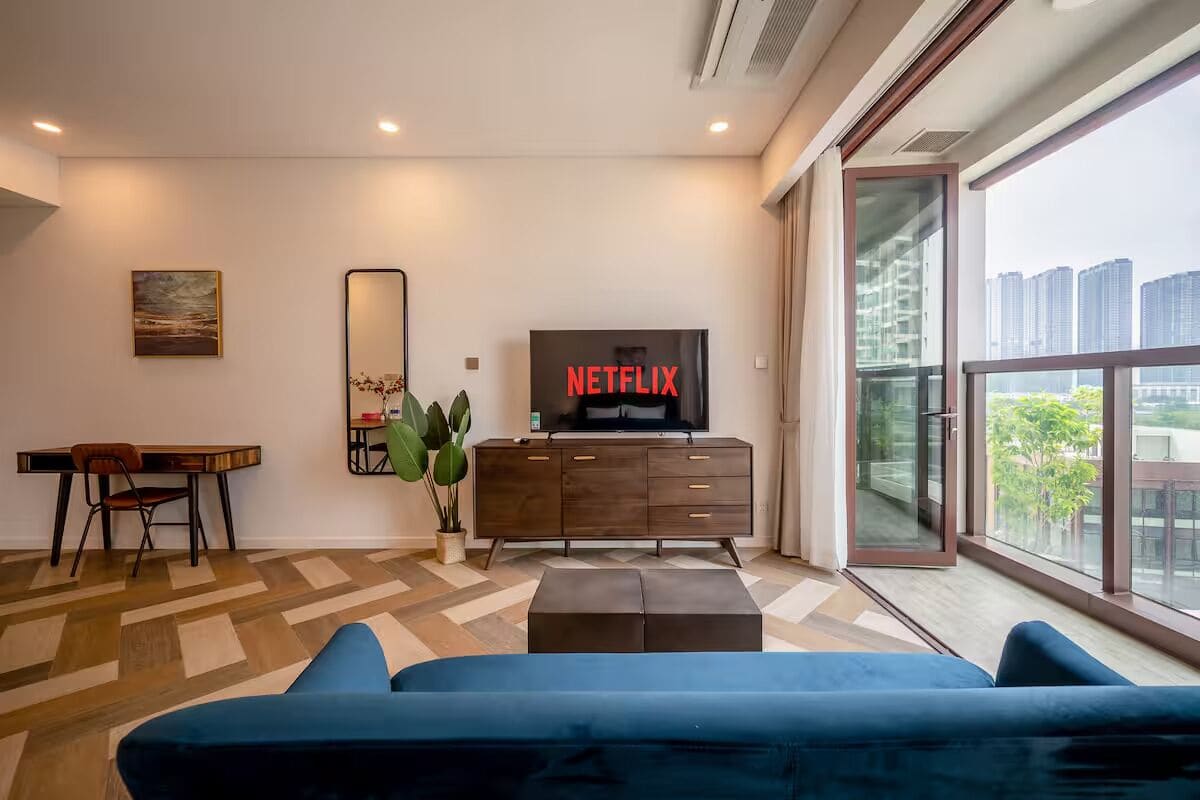 Luxury Apartment, 1 Bedroom, Balcony, City View | Living area | 55-inch Smart TV with digital channels