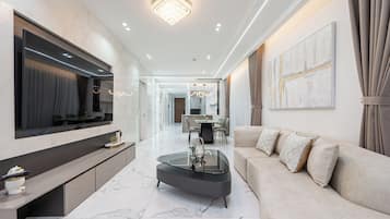 Premium Apartment, 4 Bedrooms, City View | Living area | 55-inch Smart TV with digital channels
