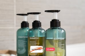 Three bottles of shampoo and body soap with black pumps. - 10% OFF 2BR Near Victoria Line • Perfect Location (London)