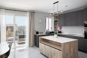 Apartamento, 2 quartos, vista para a cidade | Cozinha privada