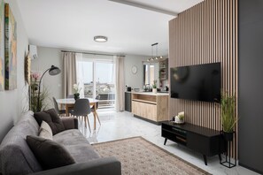 Apartamento, 2 quartos, vista para a cidade | Área de estar