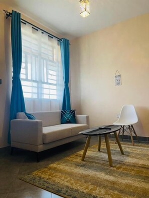 Basic Apartment, Balcony, Hill View | Living area - Amani Oasis (Taveta)