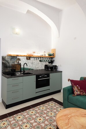 Apartamento, 1 cama Queen, vista para a cidade | Cozinha privada