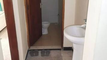 Shower, towels, soap, toilet paper