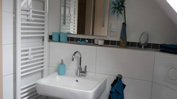 Een douche, een haardroger