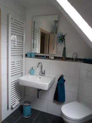 Een douche, een haardroger