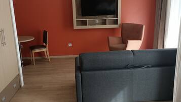Familienstudio | VerdunkelungsvorhĂ€nge, schallisolierte Zimmer, BĂŒgeleisen/BĂŒgelbrett
