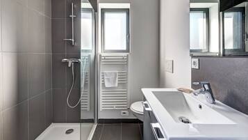 Double Room | Bathroom | Shower, towels, toilet paper