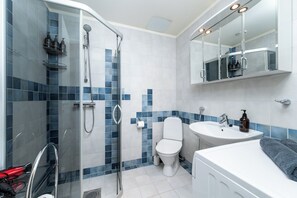 Shower, hair dryer, towels, soap
