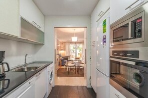 Fridge, microwave, oven, dishwasher - Beach Access Apt in Playa Real | Pool & Terrace - Pass the Keys (Marbella)