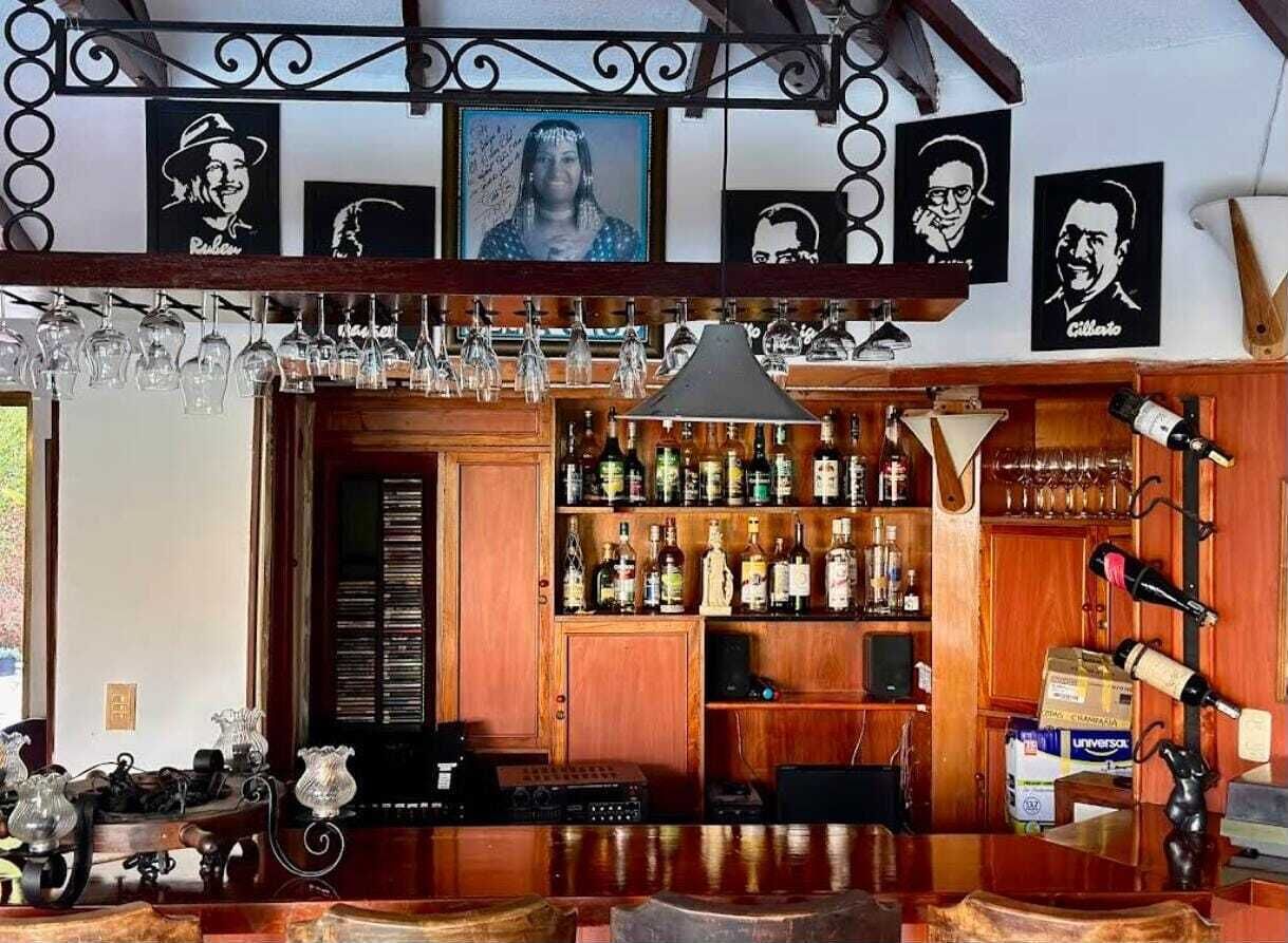 Traditional Room, Multiple Beds, Garden View | Bar (on property)