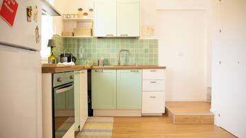 Apartment, Partial Sea View | Private kitchen