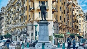 A large building with a statue in front. - Yacoubian Hotels (Cairo)