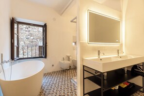 Hair dryer, bidet, towels, soap