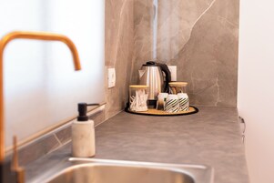 Estudio Deluxe, patio, vistas al patio | Interior