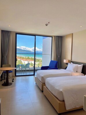 Luxury Studio, Balcony, Ocean View | Desk, laptop workspace, free WiFi - SeaLaVie Arena Resort Condotel (Cam Ranh)