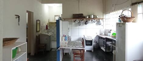 Fridge, stovetop, blender, cookware/dishes/utensils