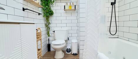 Jetted tub, hair dryer, towels, soap