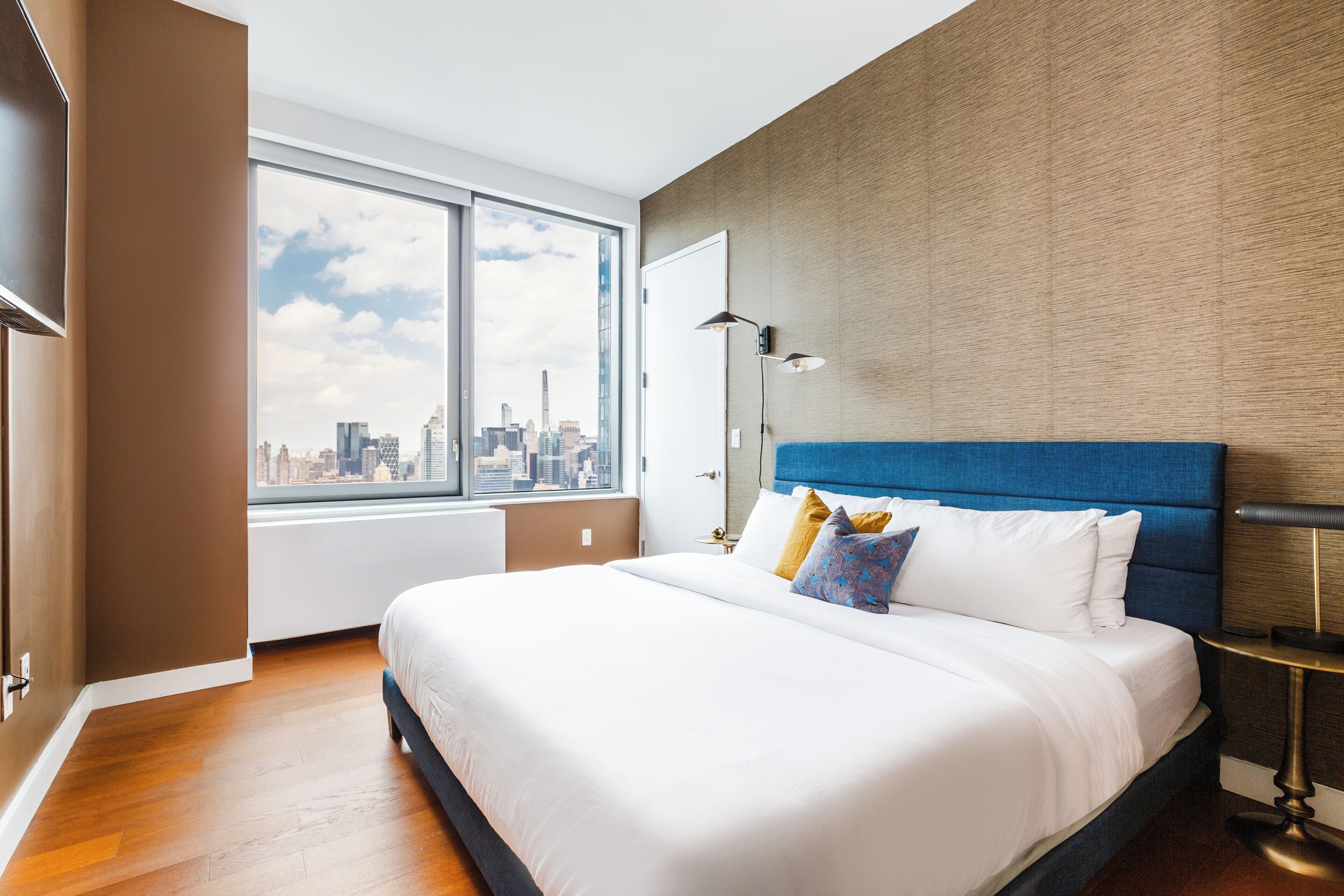 Luxury Suite, City View | Laptop workspace, iron/ironing board, free WiFi