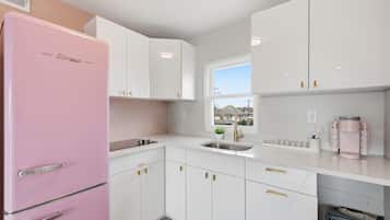 Mini-fridge, microwave, espresso maker, dining tables