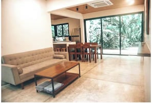 Living area - Beachside 3BR + Private Catamaran Fishing Hosted by Your Stay (Mal Pais)