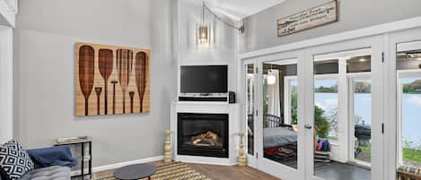 TV, fireplace, books
