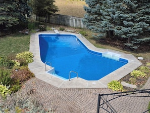Outdoor pool, a heated pool - Family Farmhouse Retreat with Huge Heated Pool, Hot Tub, 9 Acres & Private Trail (Harrowsmith)