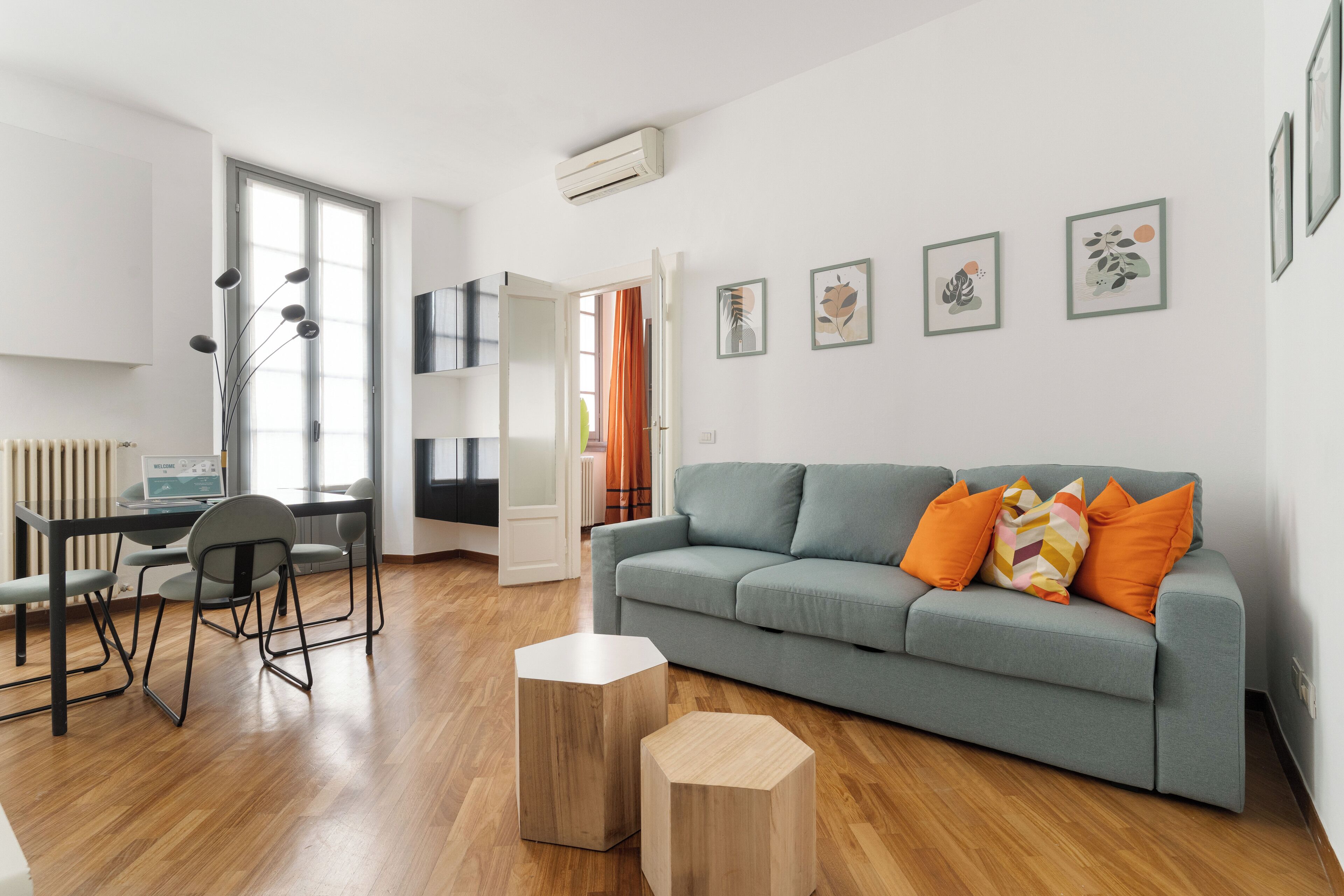 One-Bedroom Apartment | Living area | 30-inch flat-screen TV with satellite channels