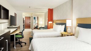 Tabla de planchar con plancha, wifi gratis y ropa de cama 