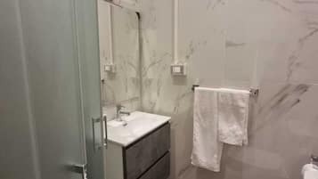 Shower, soap, toilet paper