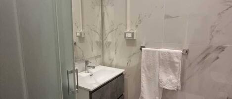 Shower, soap, toilet paper