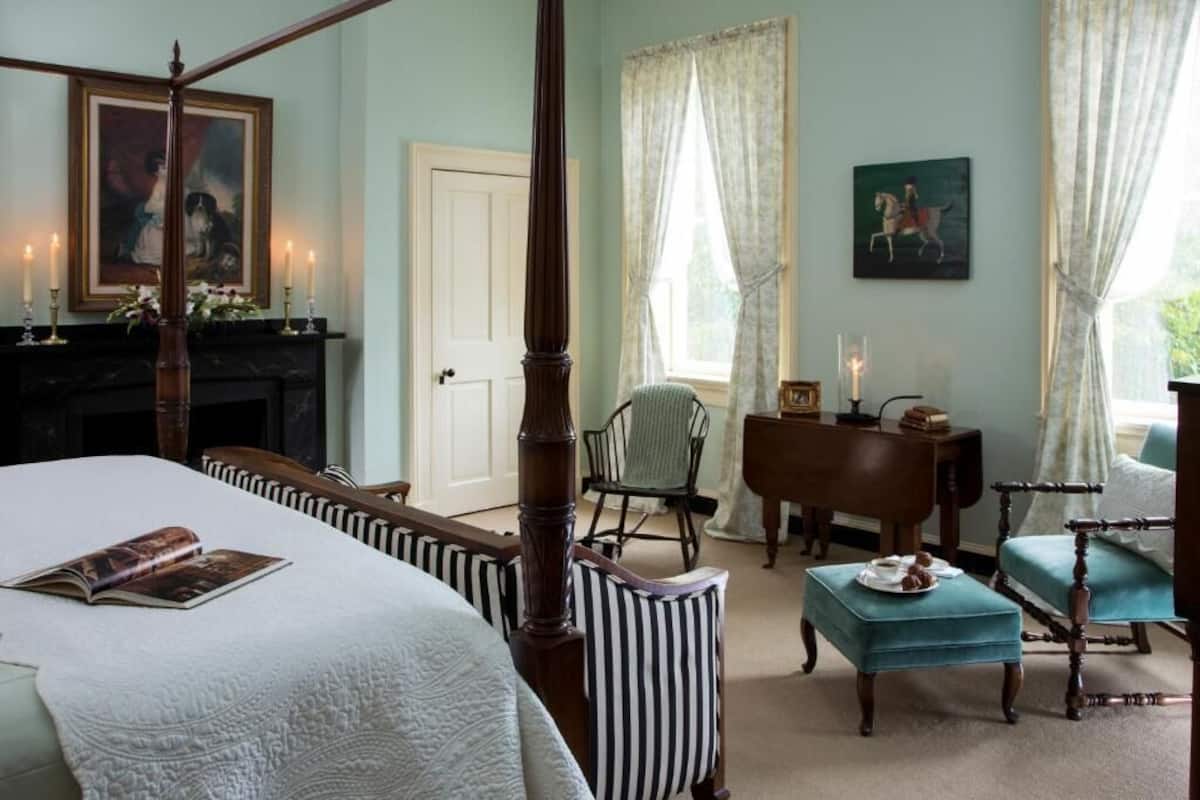 Luxury Suite, Private Bathroom, Garden View | Desk, soundproofing, iron/ironing board, free WiFi