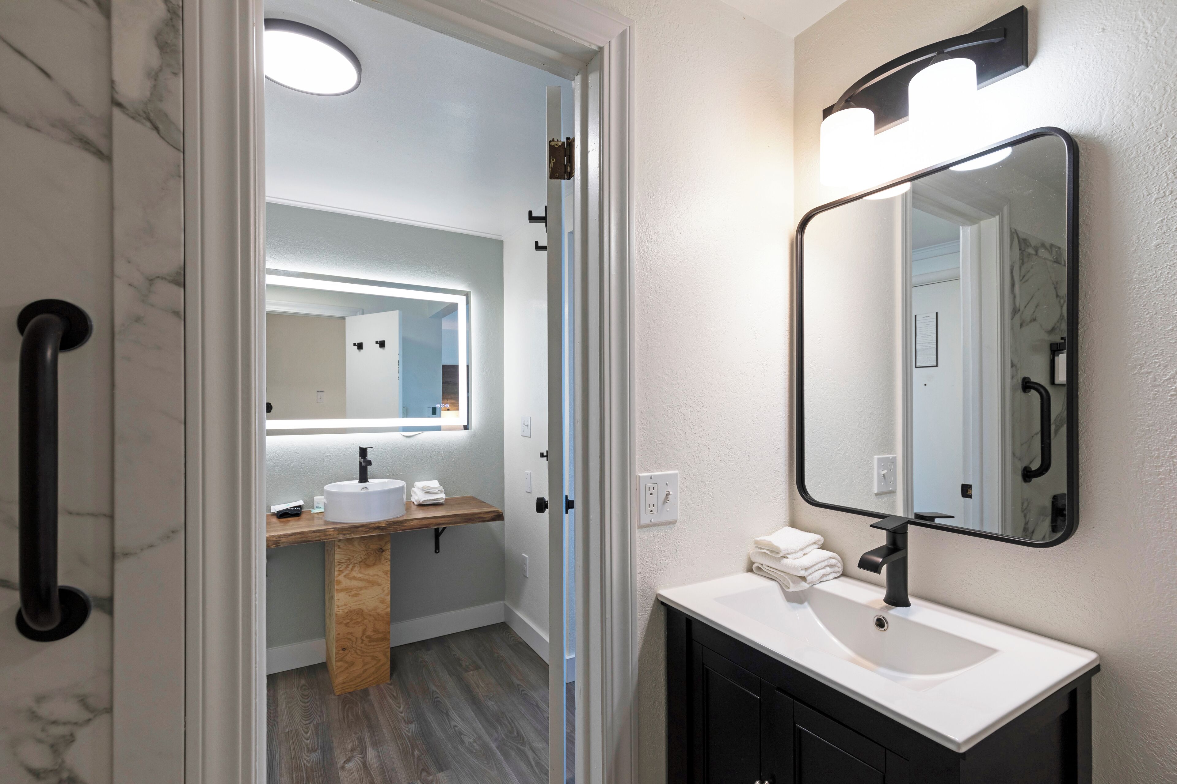 Shower, hair dryer, towels, toilet paper