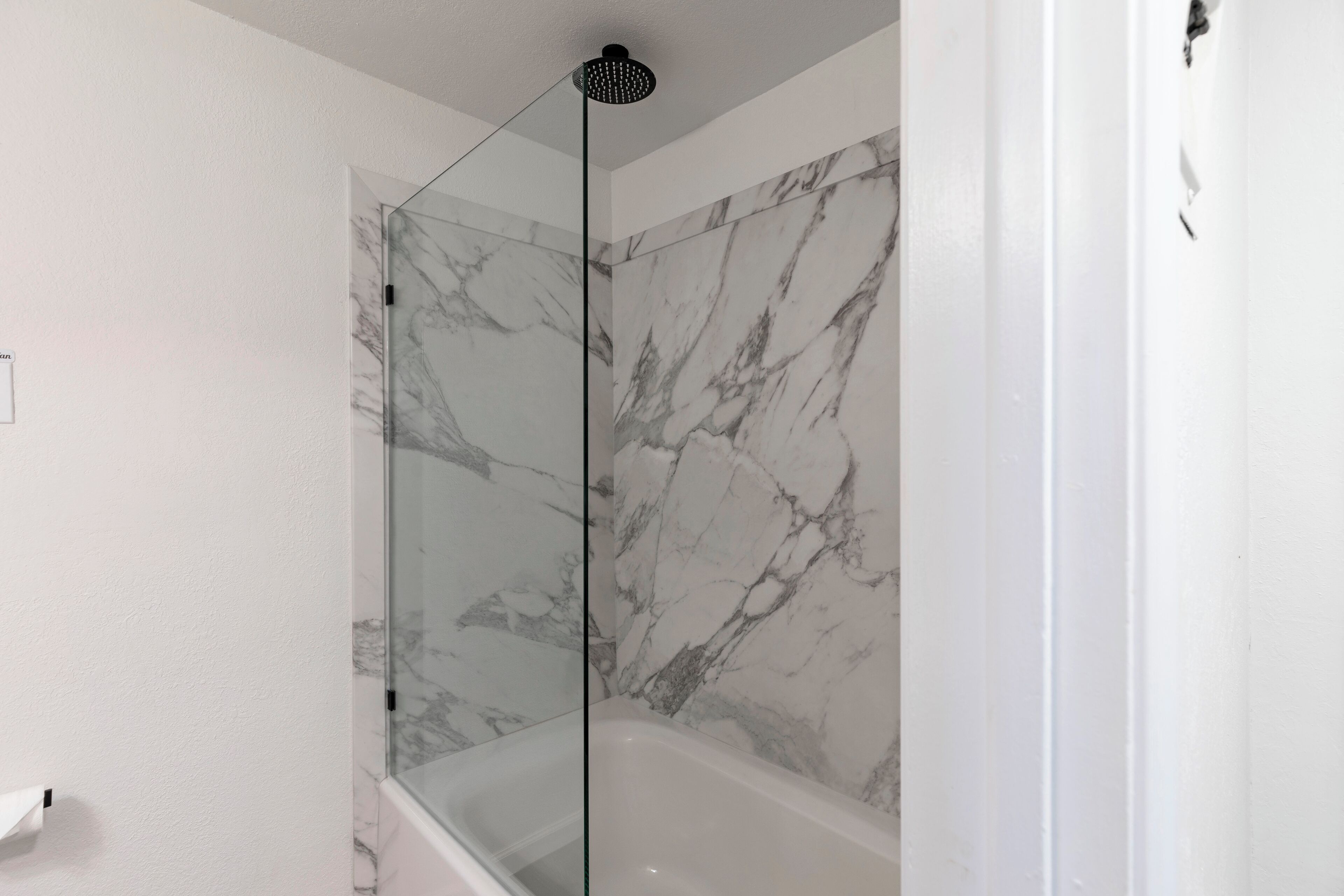 Shower, hair dryer, towels, toilet paper