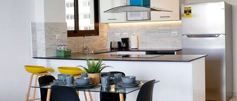 Exclusive Apartment | Private kitchen | Full-sized fridge, microwave, stovetop, cookware/dishes/utensils