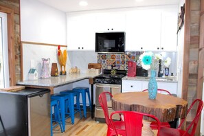 Fridge, microwave, stovetop, coffee/tea maker