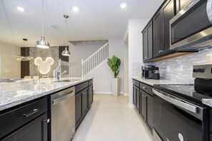 Fridge, microwave, oven, stovetop - 5BR Windsor Cay Pool Home with Game Loft (Clermont)