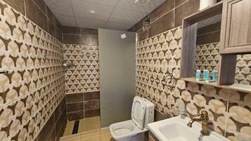 Triple Room, Private Bathroom, Desert view | Bathroom | Shower, towels, soap, toilet paper