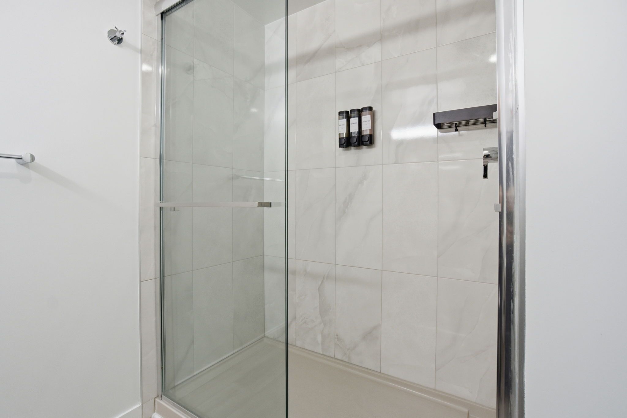 Shower, towels, soap, toilet paper