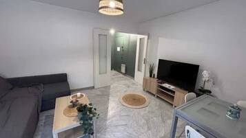 Apartemen, 1 Tempat Tidur Double dengan tempat tidur Sofa, balkon, pemandangan kota (500 BONNEFOY) | Area keluarga