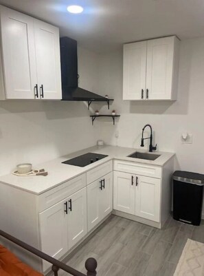 Stovetop, cookware/dishes/utensils, paper towels, dining tables - Perfect South Austin Location Studio Unit (Austin)
