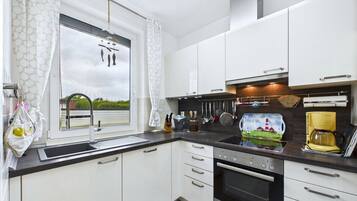 Réfrigérateur, micro-ondes, four, lave-vaisselle