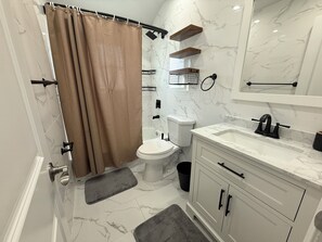Hair dryer, towels, soap, toilet paper