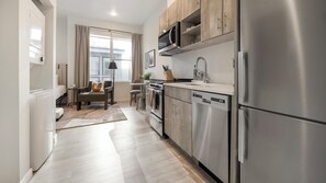 Studio (0 Bedroom) | Private kitchen | Fridge, microwave, oven, stovetop - Landing Apartments - Denver LoHi Near Union Station (Denver)