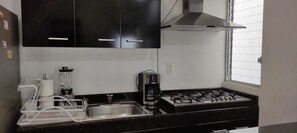 Private kitchen - Beautiful family home in private and quiet gated community. (Cancún)