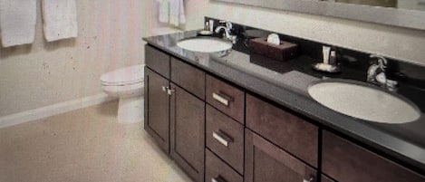 Secadora de cabello, toallas, jabón, papel de baño