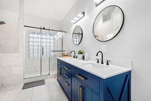 Shower, hair dryer, towels, soap